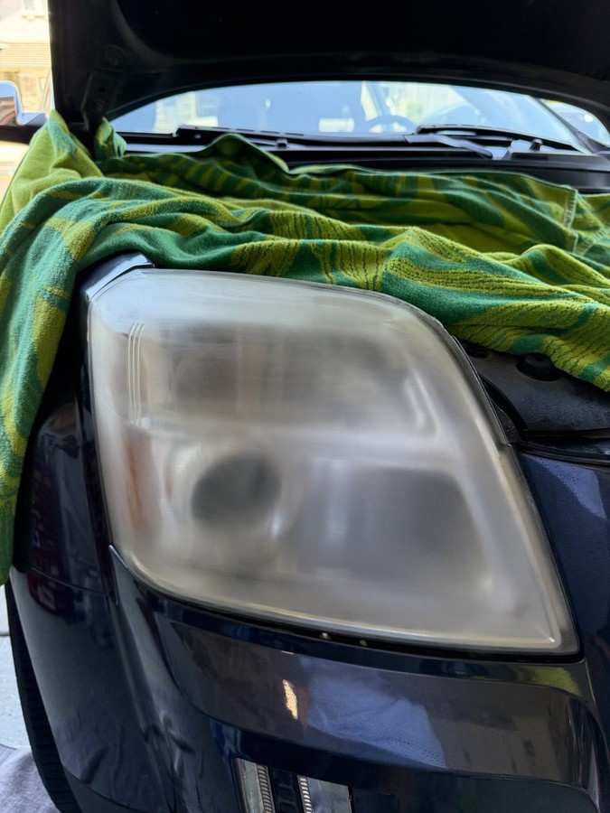 Cloudy, oxidized headlight before restoration